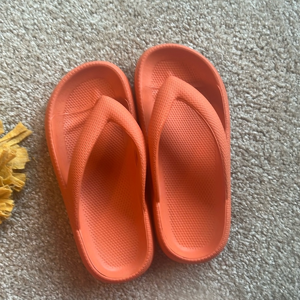 Size 36 orange flip flops